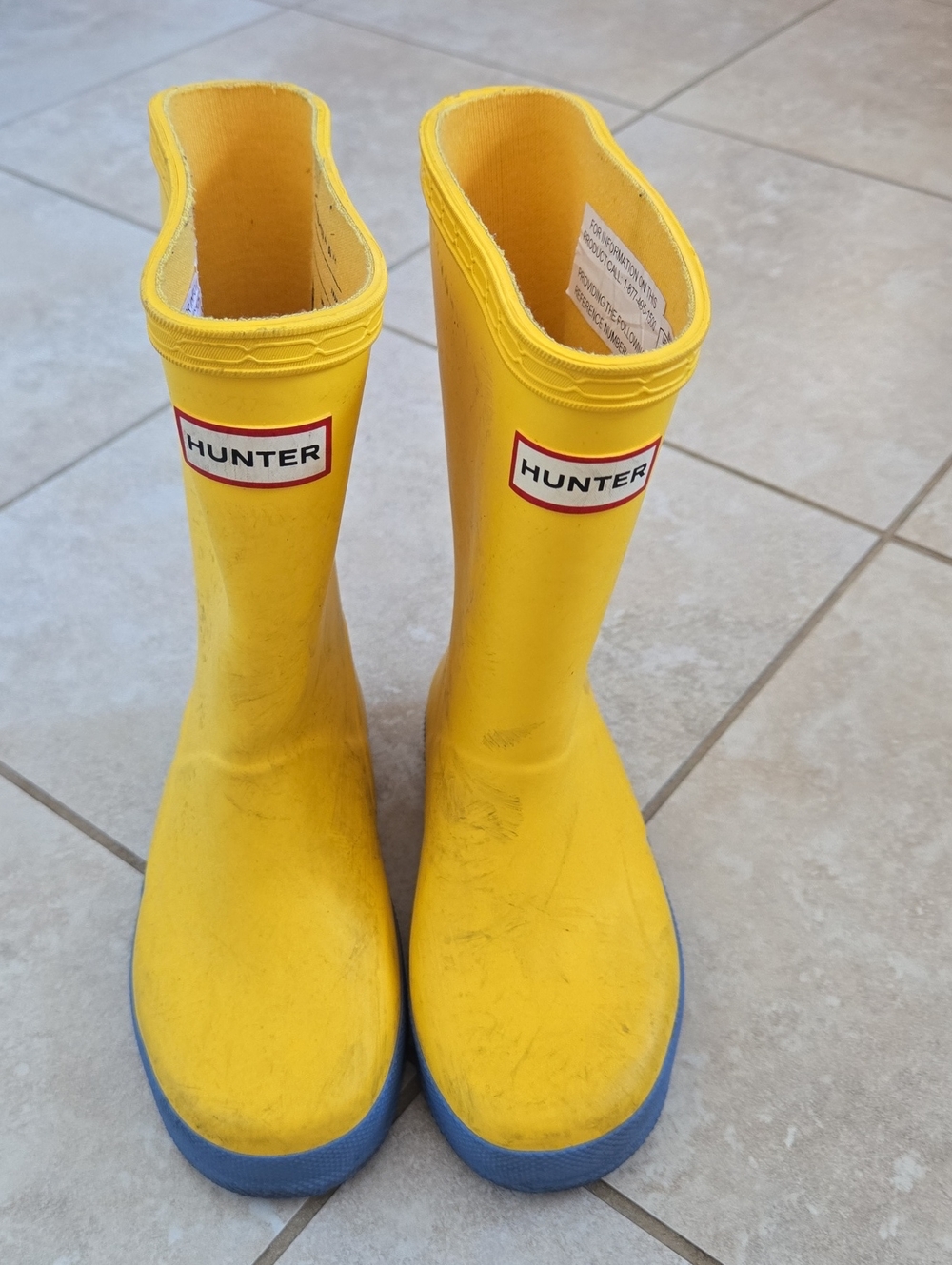 Hunter Kids Yellow Rain Boots with Blue Soles